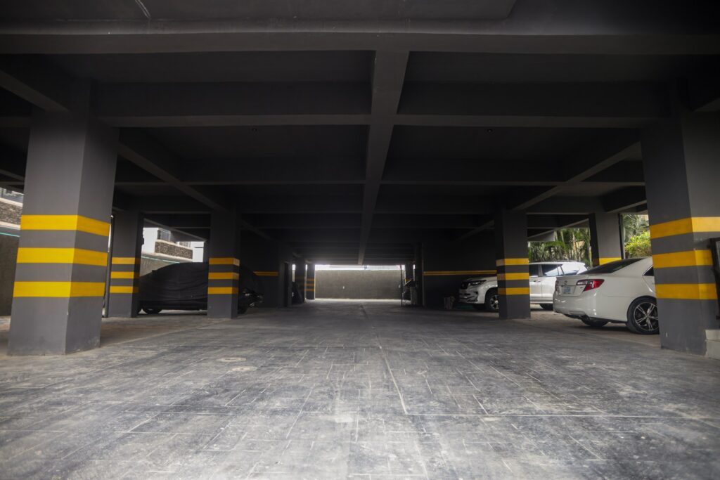 Brum Height 5: Covered parking area beneath the residential building